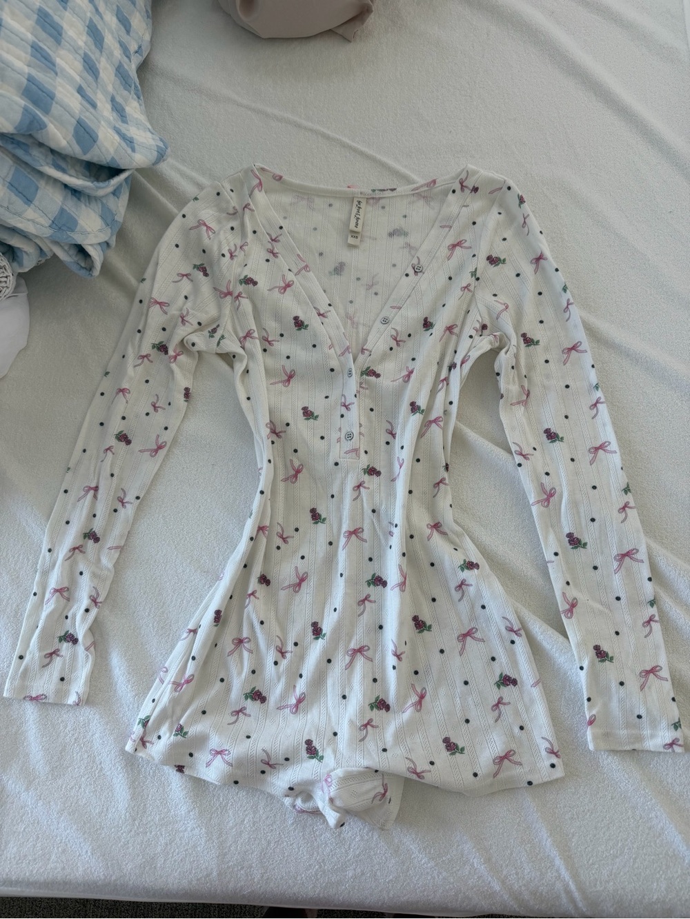 For Love & Lemons White Ribbed Henley onesie with Pink Bow and Floral Detail